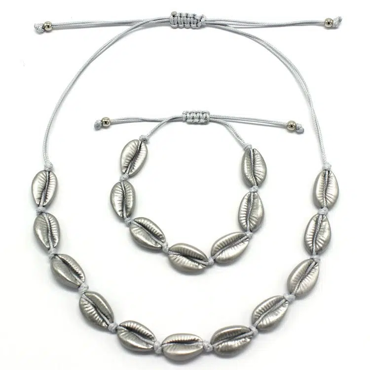 9dc770f9 01e3 4836 a7c5 a9db8f8d8658 Shell Necklace and Silver Bracelet Set